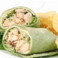 Chicken Caesar Wrap · Grilled chicken, parmesan cheese, black olives, romaine lettuce and caesar dressing.