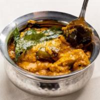 Baghare Baingan · Baby eggplant cooked nizami style, coconut, peanuts, spices.