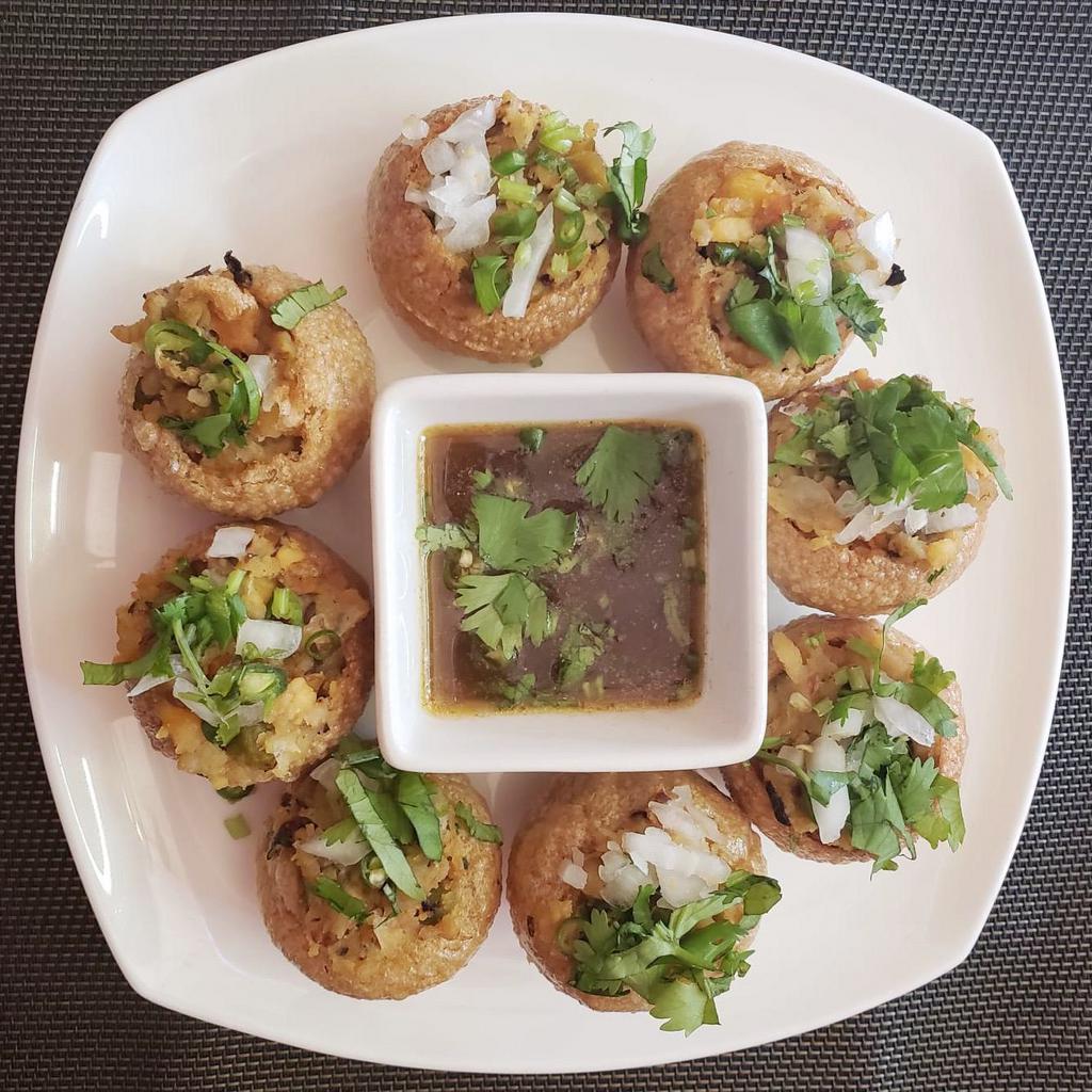 Fuchka (Pani-puri) · hollow poori filled with seasoned potato & chickpeas. served with tamarind water.
Note: to retain the freshness, the ingredients are packed separately. 