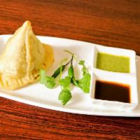 Chicken Samosa (2 pieces) · A turnover filled with minced chicken. 
