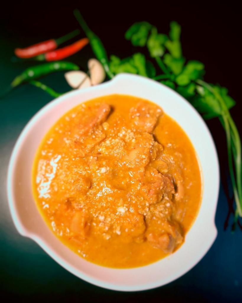 Chicken Korma · Boneless chicken cooked in a coconut milk/cream-based gravy of onion, cashew, and blend of aromatic spices.