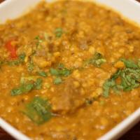 Beef with Daal · Boneless beef cooked with daal, ginger, cumin and, garlic. 