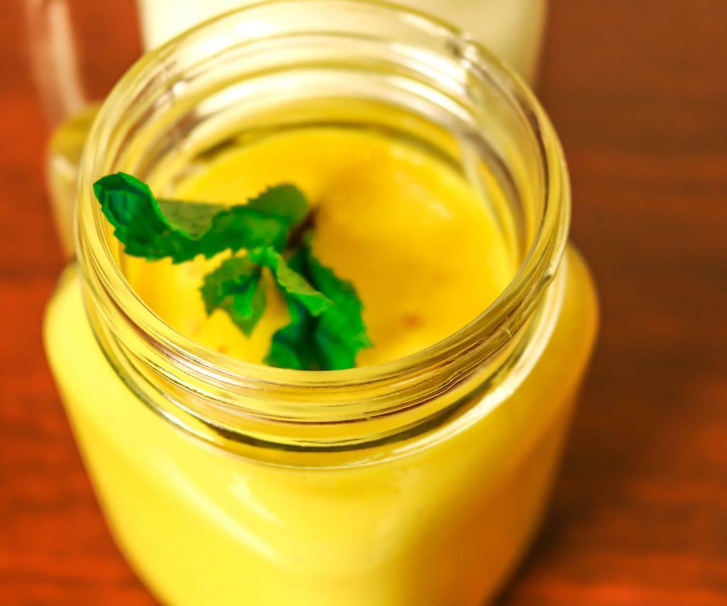 Mango Lassi · Sweet Yogurt drink with mango pulp. 
