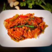 Rui Fish Dopiaza · Rui fish in a tomato and onion-based dry sauce. Includes complementary basmati rice or plain...