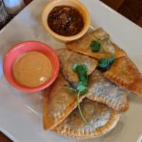 C&B Empanadas · 6 golden turnovers with choice of filling, served with a ranch chipotle sauce. Filling choic...