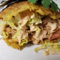 PATACON (FRIED GREEN PLANTAIN SANDWICH) · The patacon is a popular Venezuelan sandwich and is made of 2 large and round slices of twic...