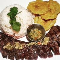 Churrsaco Steak Platter · Grilled skirt steak with a chimichurri drizzle