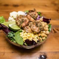Tex Mex Salad · Shrimp, corn, chickpeas, cauliflower, red onion, lime, and house greens.