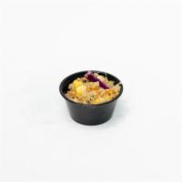 Asian Quinoa Salad · An all organic medley of quinoa, carrot, cabbage, green onion, corn, sesame oil, ginger, and...