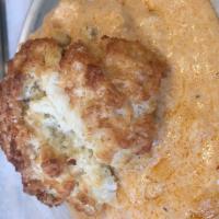 Biscuits and Gravy · Chopped-winning biscuit, paprika sausage gravy.