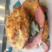 Ham Melt · Crispy Olympia provisions ham, smoked Gouda, mustard aioli, homemade pickles on a biscuit.