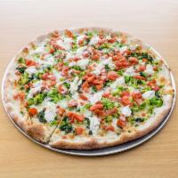 Primavera Pizza · Broccoli, spinach, fresh tomatoes, garlic, ricotta, and mozzarella cheese.