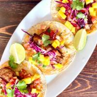 California Fish Taco (1pc) · salmon, cabbage, cilantro, chipotle aioli, mango, pico de gallo