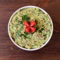 Guacamole & Chips · Homemade! Avocados, lime juice and jalapenos and fresh cilantro. Guaranteed delicious!