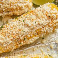 Elote (1pc) · grilled corn on the cob with chile powder, cotija and chipotle mayo