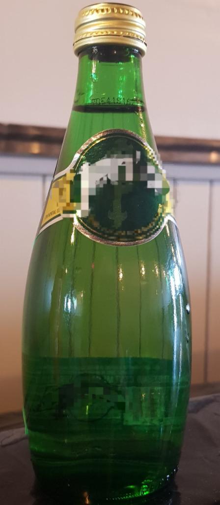 Perrier Sparkling Water · 330 ml. bottle.
