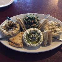 Appetizer Sampler (For 2-3 people) · Tabouleh, labneh, hummus and baba ghanoush. Served with 2 pitas. Vegetarian and vegan.
