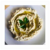 Baba Ghanoush · Eggplant spread with tahini sauce and spices.