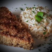 Baked Kibbeh/Kipe Charola · Beef and cracked wheat meat pie served with a side of vermicelli rice. Contains pine nuts.
P...