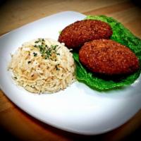 2 Piece Kibbeh Croquettes · 2 quarter pound beef and cracked wheat croquettes, stuffed with beef and pine nuts. Served w...