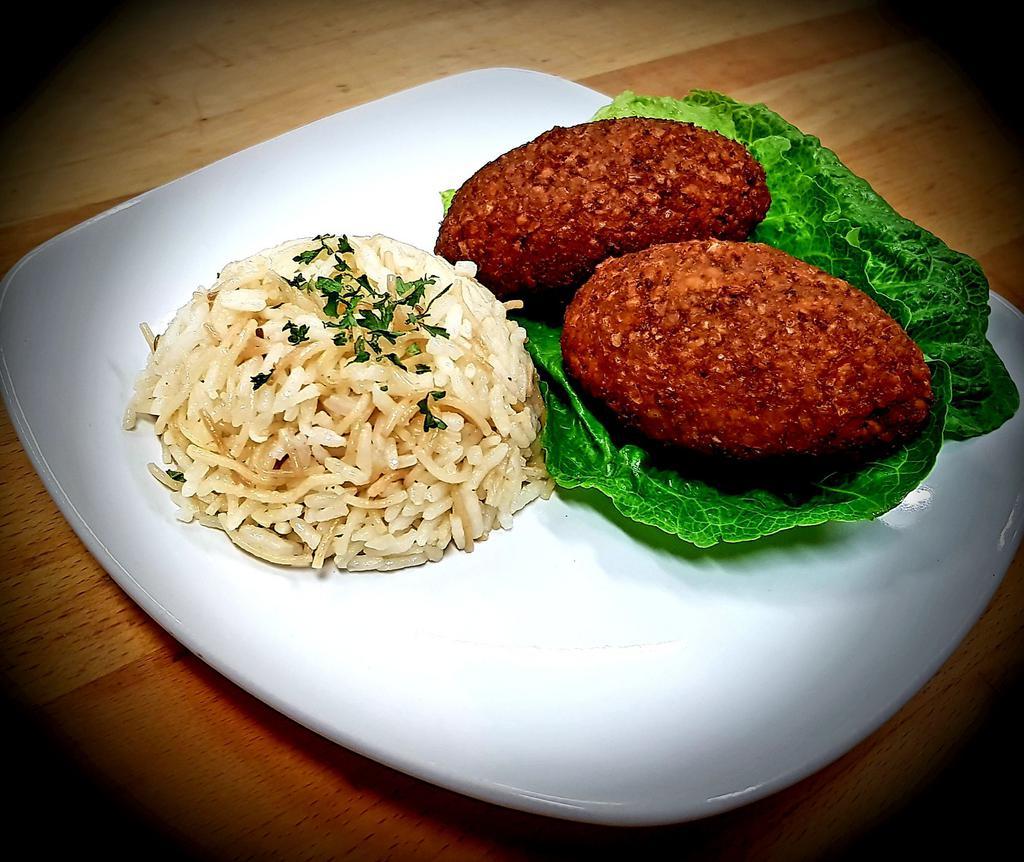 2 Piece Kibbeh Croquettes · 2 quarter pound beef and cracked wheat croquettes, stuffed with beef and pine nuts. Served with a side of vermicelli rice.