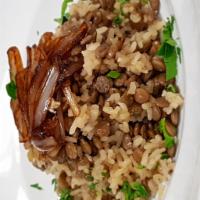 Mujaddara · Seasoned rice and lentils topped with caramelized onions. Vegan.