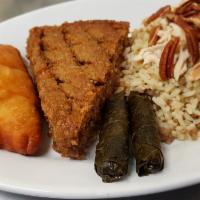 Lebanese Sampler · 1 baked kibbeh, 2 grape leaves, 1 empanada, 1 kousa mahshi, layali rice and a side of tabbou...