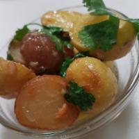 Harra Potatoes · Potatoes sautéed in olive oil with garlic and cilantro