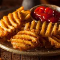 Build Your Own Waffle Fries · Oven-roasted waffle-cut semi-spicy potatoes. Option with melted cheddar and bacon with melte...