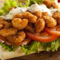 Shrimp Po-Boy · Classic Louisiana po boy sandwich with fried shrimp, shredded lettuce, tomato, and homemade ...