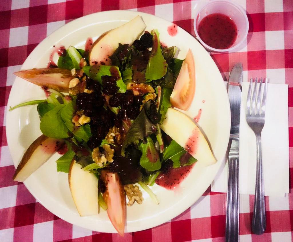 Pear Salad · Mixed greens, dried cranberries, tomatoes, walnuts & raspberry dressing