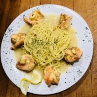 Shrimp Francese · Dipped in egg, sauteed with lemon, butter and white wine. Served with pasta or house salad.