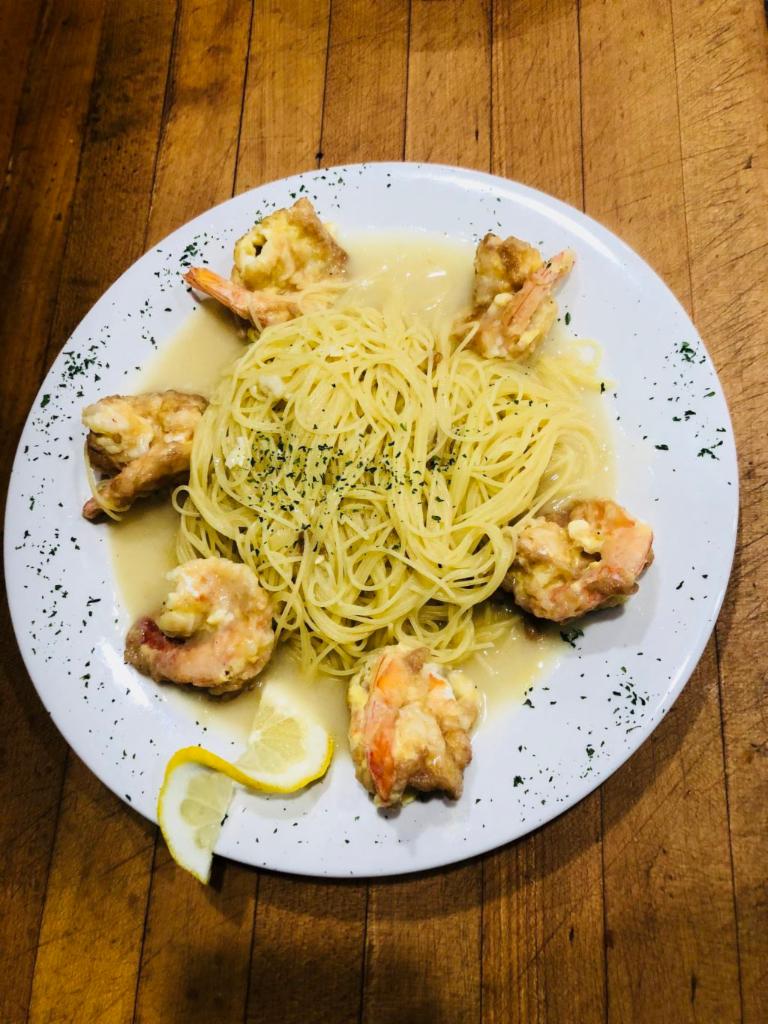 Shrimp Francese · Dipped in egg, sauteed with lemon, butter and white wine. Served with pasta or house salad.