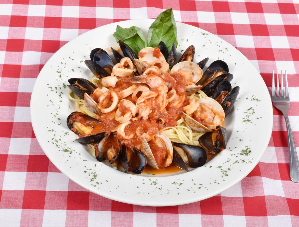 Seafood Marechiara · Shrimp, clams, mussels and calamari in a marinara sauce. Served with pasta or house salad.