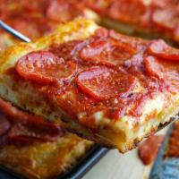 Sicilian Pizza by Slices · Slices of Sicilian Pizza 