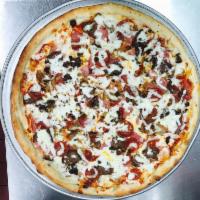 Meat Lover Pizza · Sausage, pepperoni, ground beef, ham, meatballs, salame