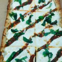 Grandma Pizza · Marinara sauce, fresh garlic,  fresh mozzarella and basil. (Square Pizza)