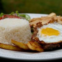 #12 Churrasco Ecuatoriano · Broiled steak Ecuadorian style with rice, eggs, and fries. topped with avocado