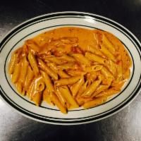 Penne in Vodka Sauce · creamy vodka sauce served with a side of bread