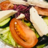 Greek Salad · Lettuce, tomato, cucumber, onion, pepper, olive, feta cheese.