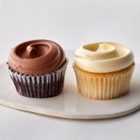 One Van/Van + One Choc/Choc Cupcake to go · One of our delicious Vanilla Cupcakes with Vanilla Buttercream, and One Chocolate Cupcake wi...