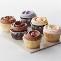 Classic Cupcake Assortment - 3 Van with Van Buttercream + 3 Choc with Choc Buttercream to go · Three Vanilla Cupcakes with vanilla buttercream: rich, buttery, old-fashioned cake with a li...