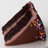 Choc/Choc Cake Slice to go · Chocolate Cake with Chocolate Buttercream.

Sprinkles chosen by the bakery.