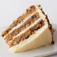 Carrot Cake Slice to go · The layers of this cake are chock-full with goodness: freshly grated carrot, coconut, pineap...