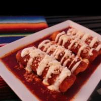 Enchiladas Rojas · 3 soft corn tortillas rolled and filled with choice of protein and cheese. Topped with tomat...