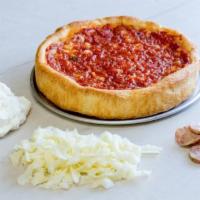 The Sausage King Pizza · Our authentic Chicago crust, layered with the perfect amount of mozzarella cheese, the best ...