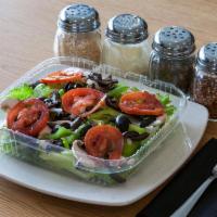 House Salad · Romaine lettuce, mushrooms, onions, tomatoes, green peppers and black olives with your choic...