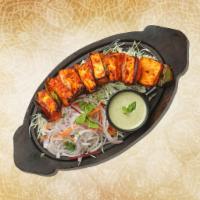 Char Grilled Cottage Cheese Tikka (6Pc) · Homemade cottage cheese cubes marinated in yogurt and spices cooked in clay oven with bell p...