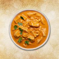 Utter-Butter Chicken · Chicken is cooked in tandoor using these spices and is simmered in a creamy and buttery toma...
