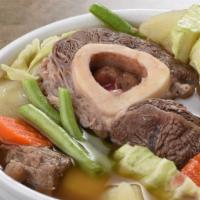 Bulalo · Hearty beef shank soup with green beans, napa cabbage, potatoes ＆ sliced carrots. Serving fo...